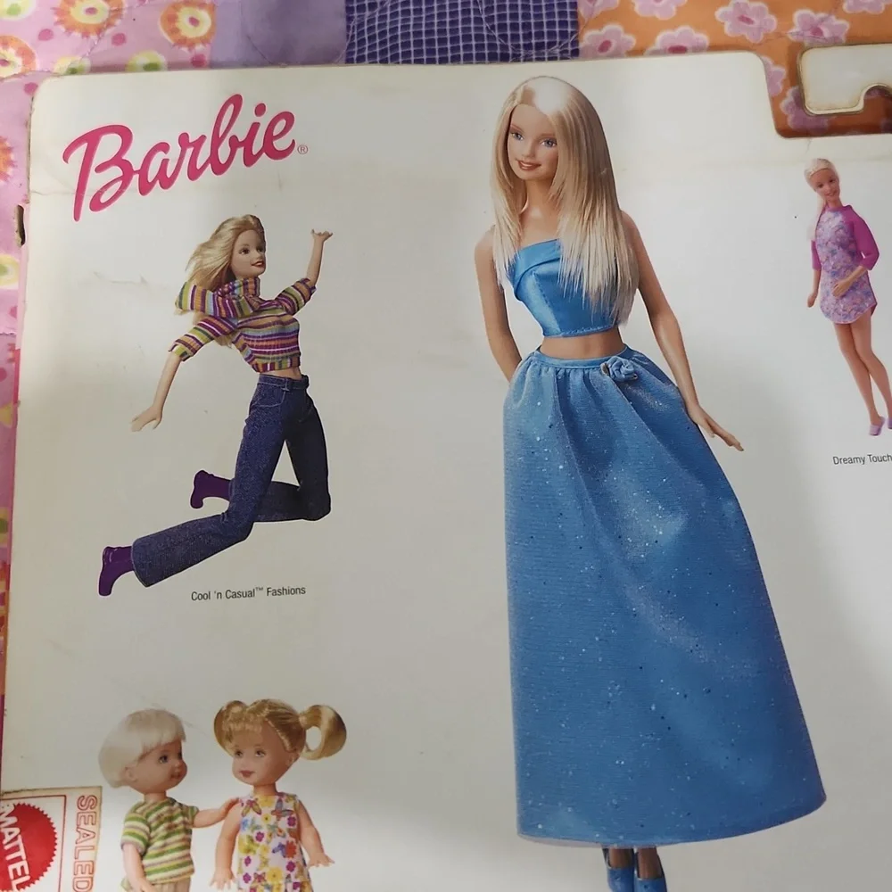 Brand New never opened Barbie fashions.
